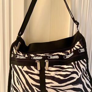 Le Sportsac medium size cross body / shoulder bag